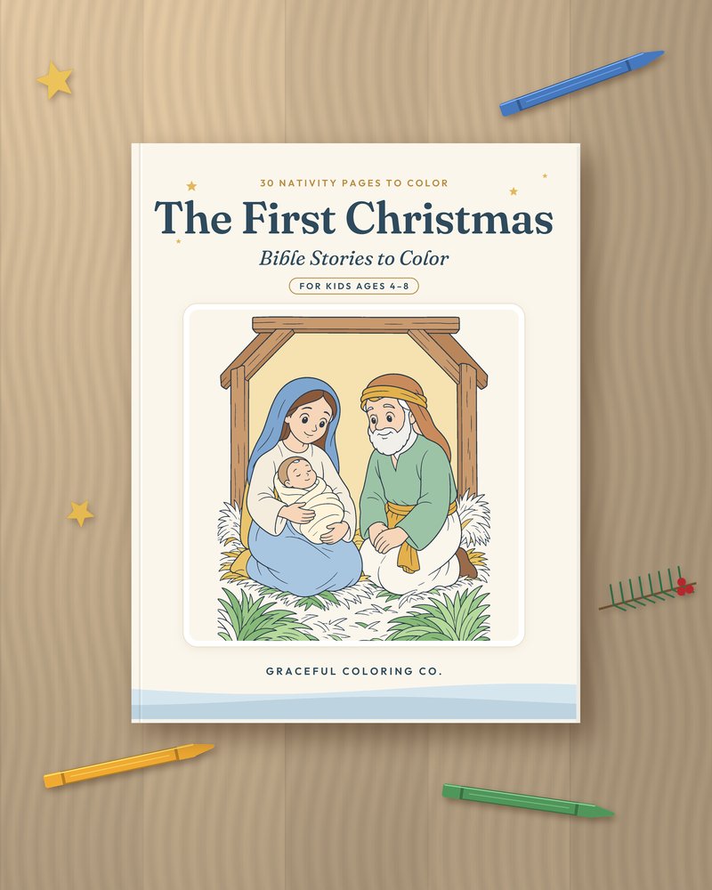 The First Christmas: Bible Stories to Color, cover showing Mary, Joseph and baby Jesus in the stable, shown on a wooden table with crayons